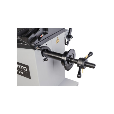 Équilibreuse de roues automatique INVENTO VBS 210 pour ateliers automobiles professionnels.